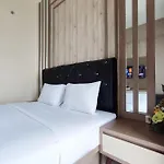 Comfortable And Modern 1Br Without Living Room At Amartha View Apartment By Travelio